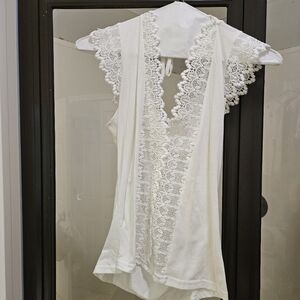 White cochet knitted top.